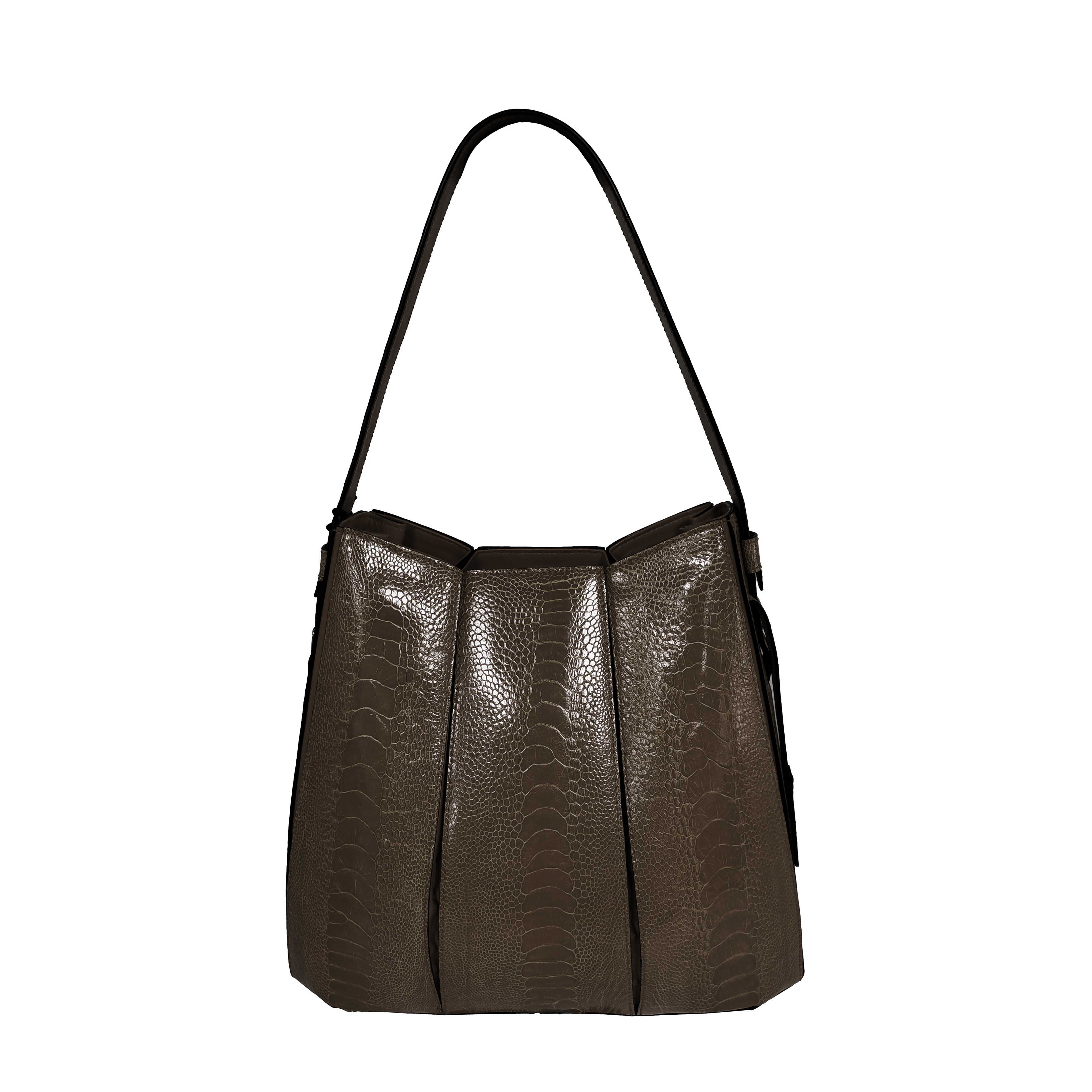 Brown textured handbag on a white background