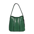 Green textured handbag on a white background