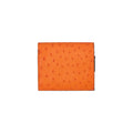 Orange textured wallet on a white background