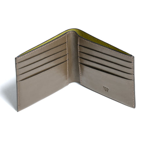 Open beige leather wallet with a brand logo on a white background