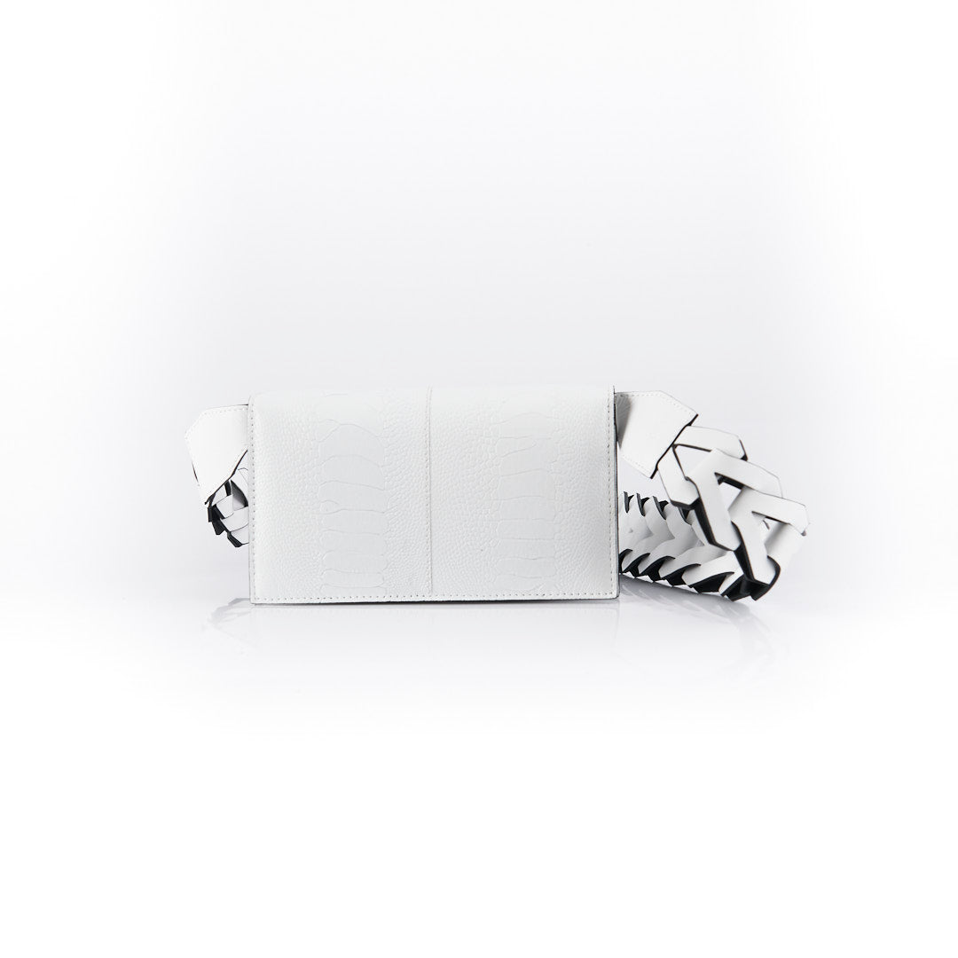 A white luxury leather purse with a geometric pattern, featuring a removable link strap and multiple compartments.