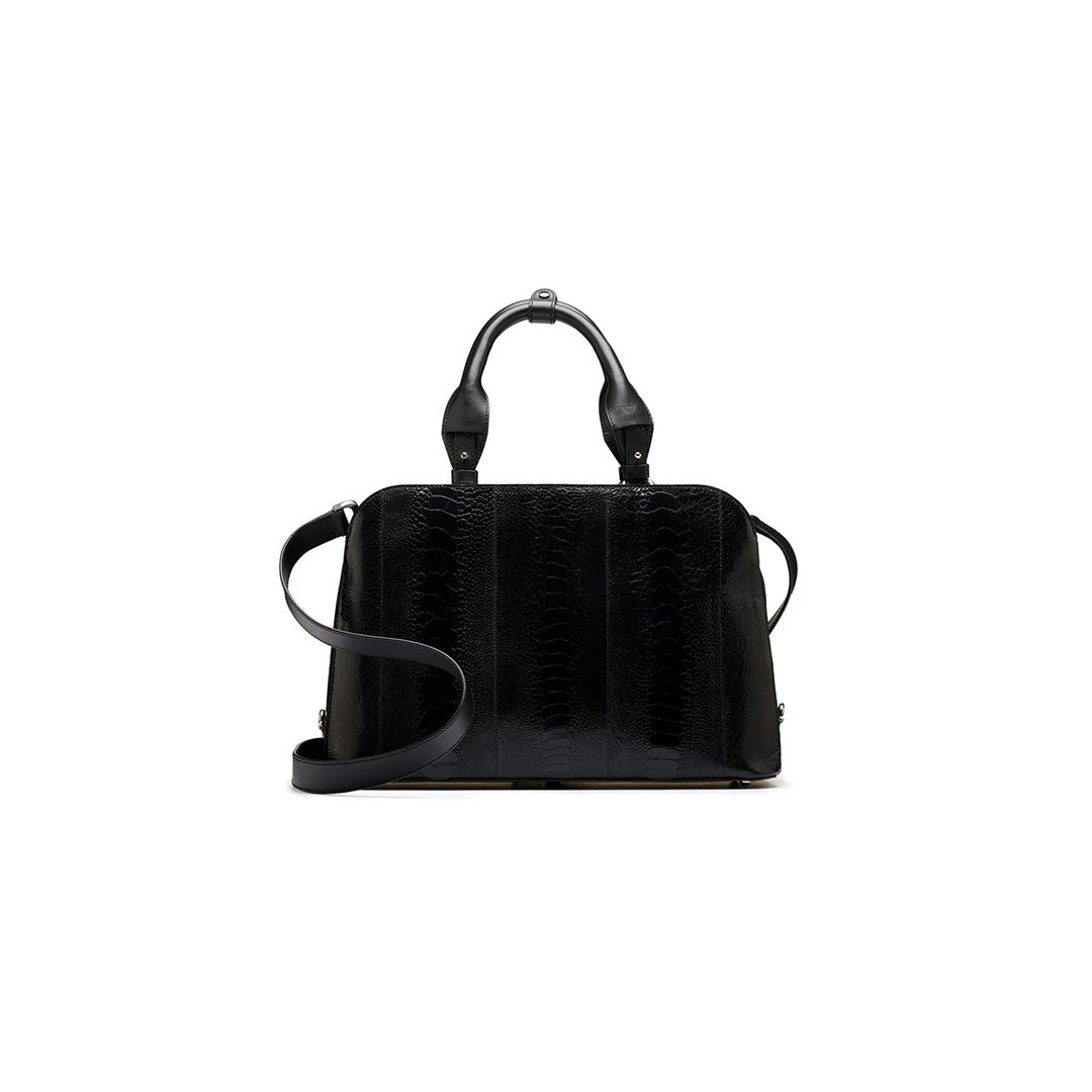 A black luxury handbag with two handles and an adjustable strap, featuring a structured design and a textured surface.