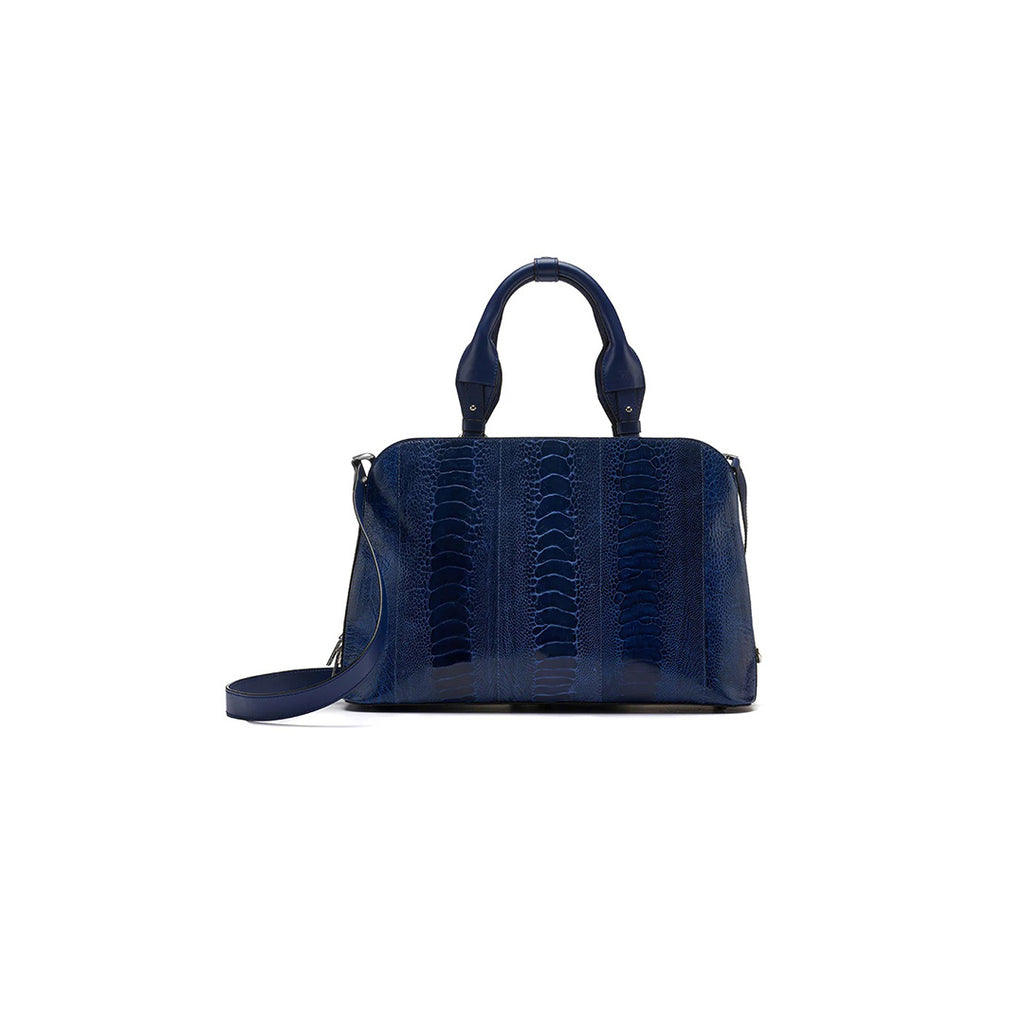 A large structured blue handbag with two handles and a detachable strap, featuring a textured design and metal feet.