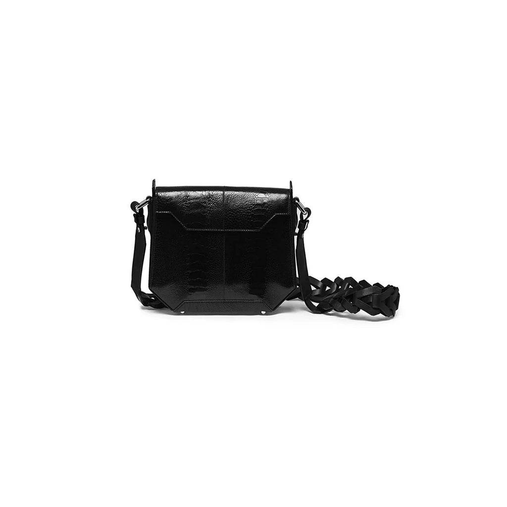 A black leather shoulder bag with a structured design, a detachable strap, and a magnetic closure.