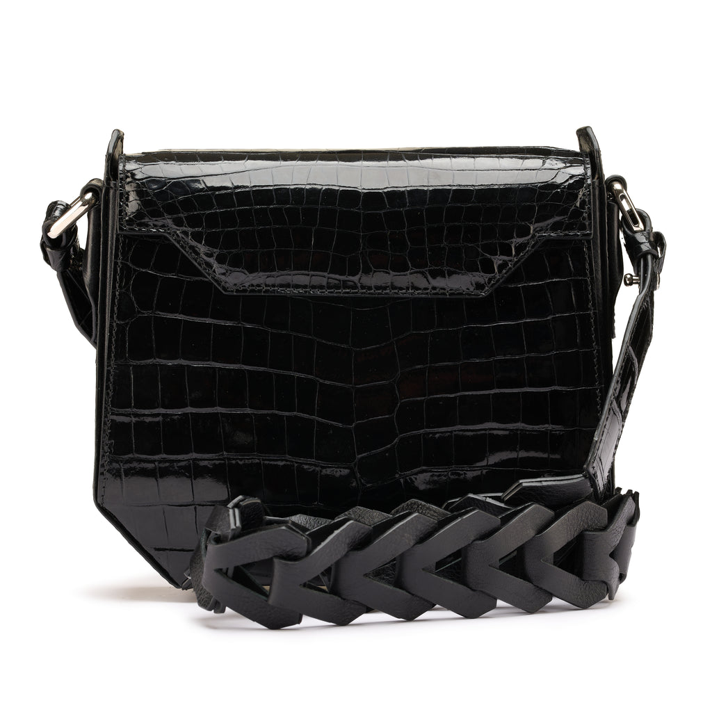 Black crocodile-patterned handbag with a braided handle on a white background