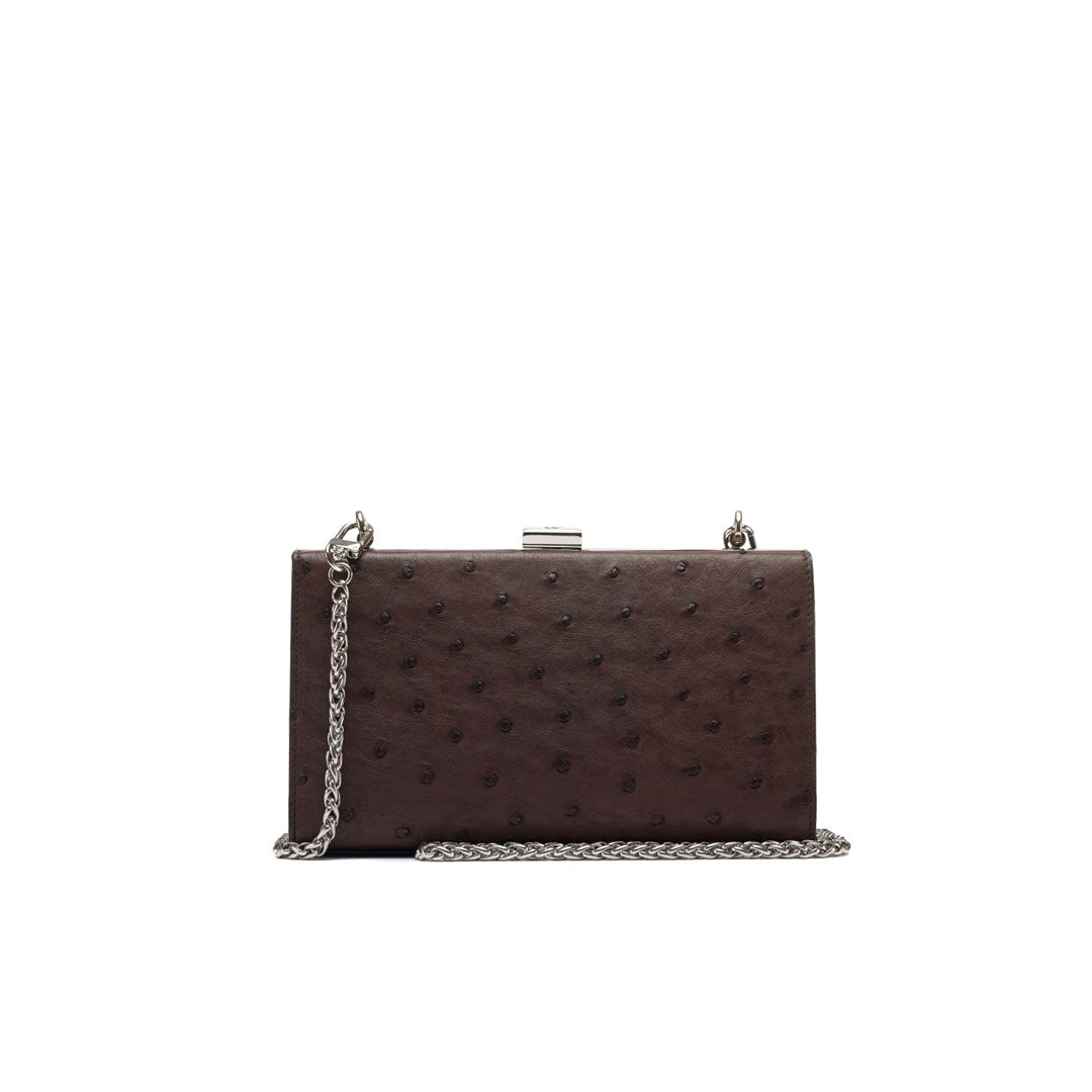 Brown textured clutch bag with a chain strap on a white background