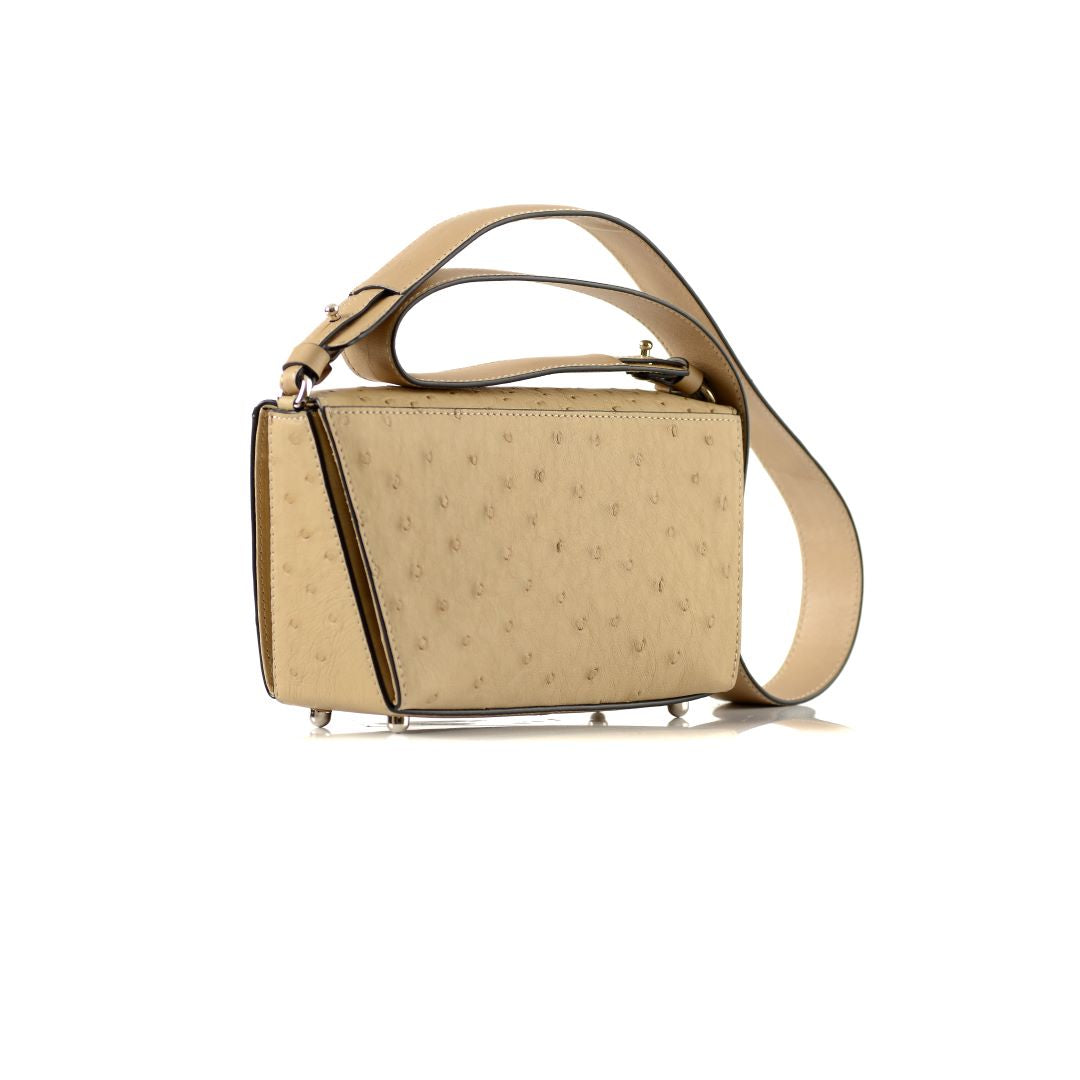 Beige handbag with a strap on a white background