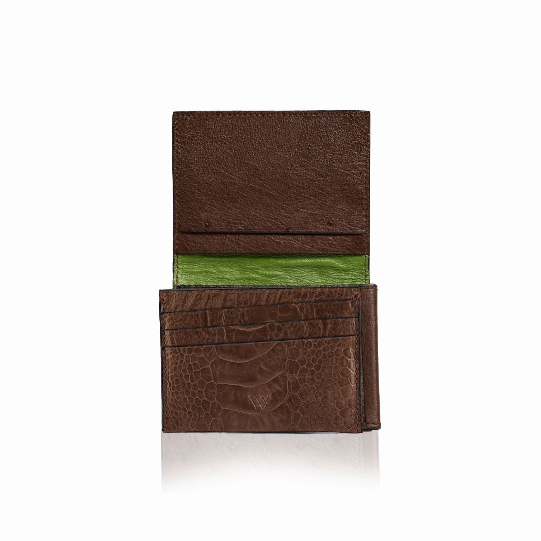 Brown leather wallet with green interior on a white background