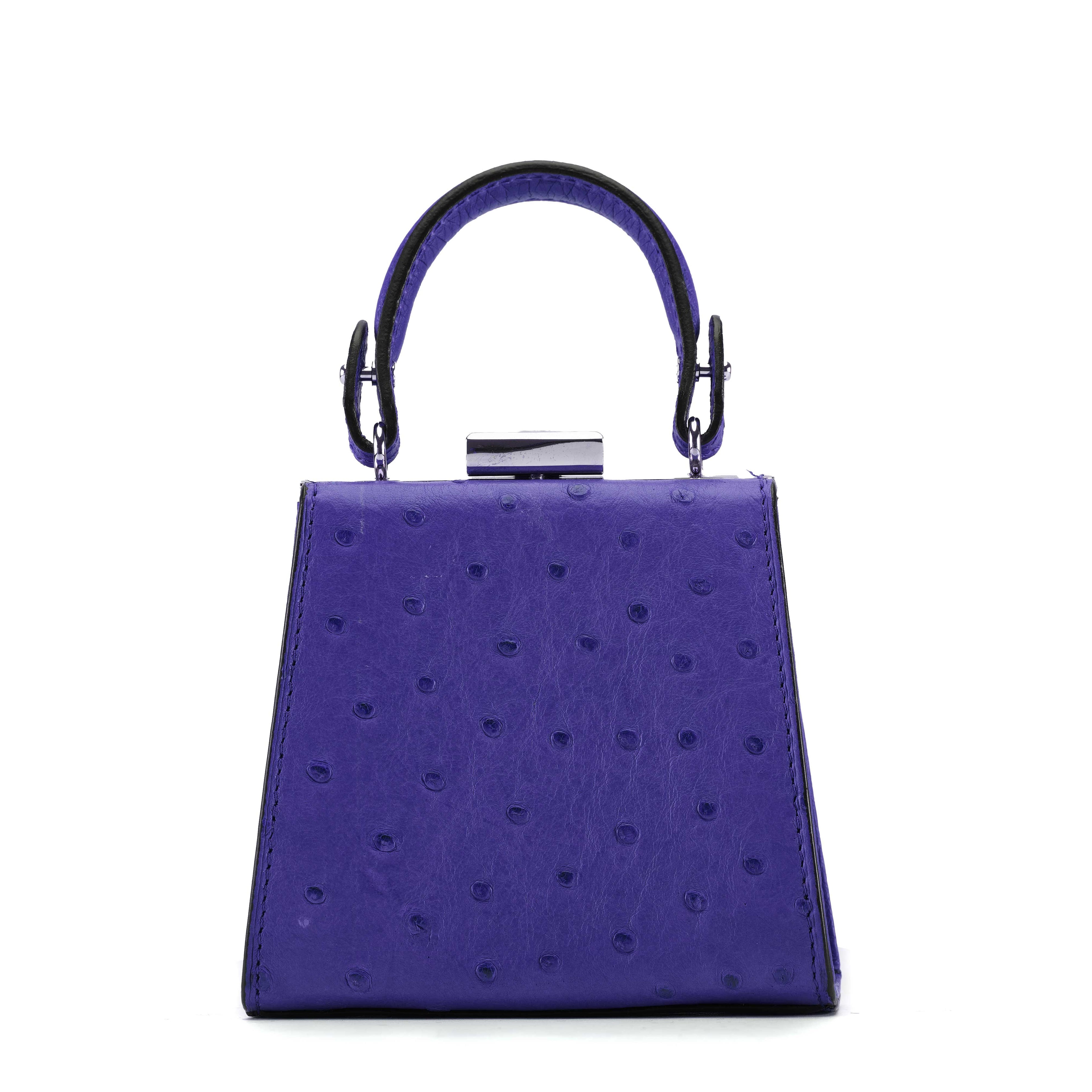 Purple handbag with a textured surface on a white background
