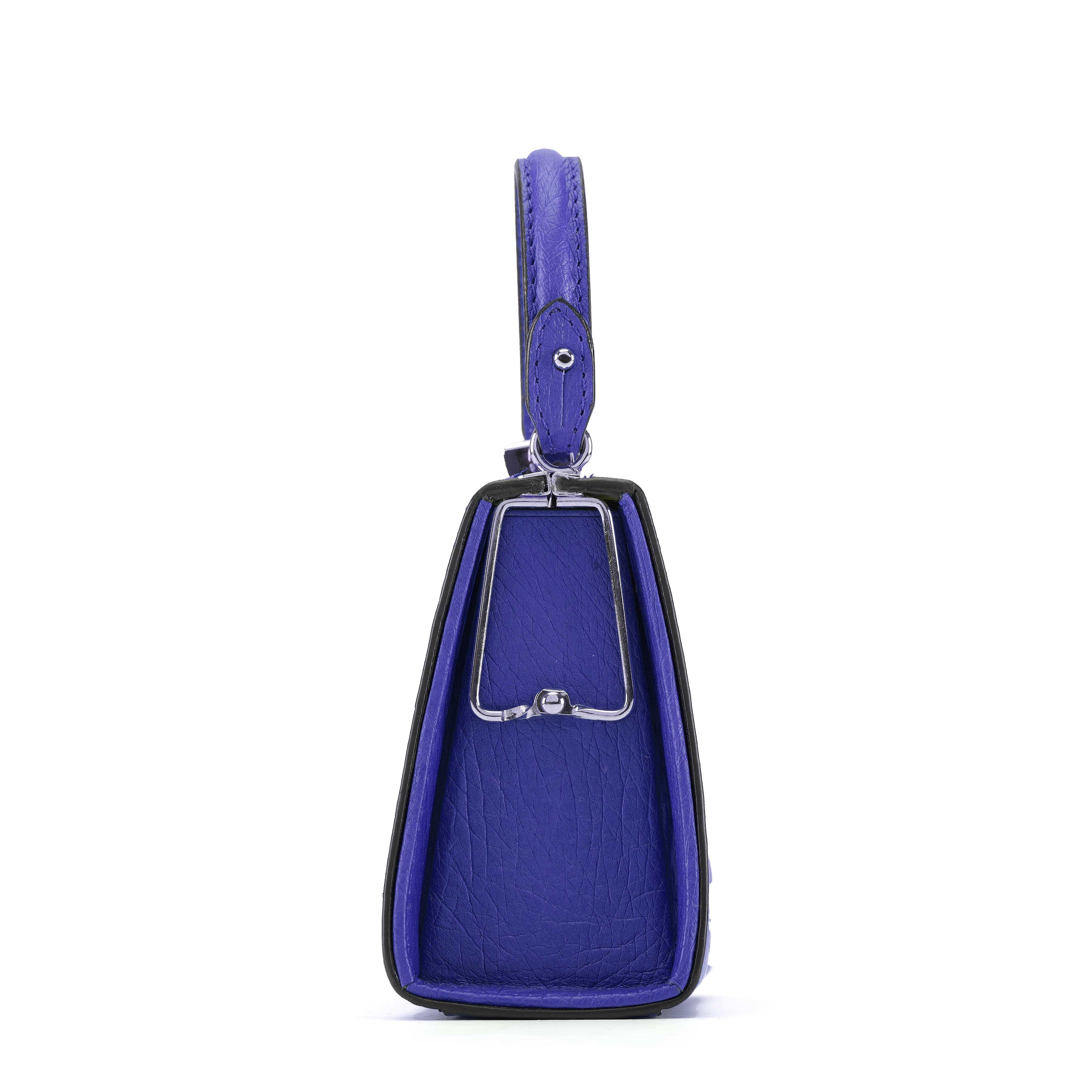 Blue handbag with a strap on a white background