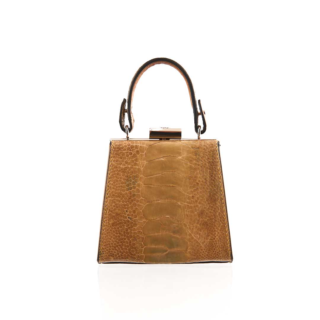 Brown leather handbag with a handle on a white background