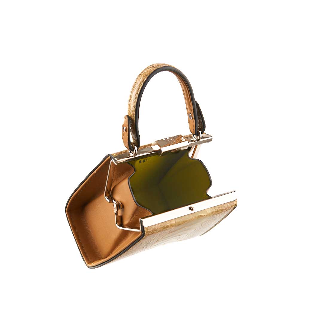 Gold handbag with a star design on a white background