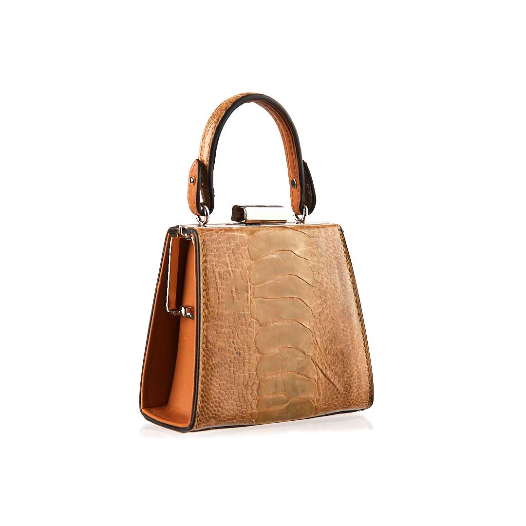 Brown textured handbag on a white background