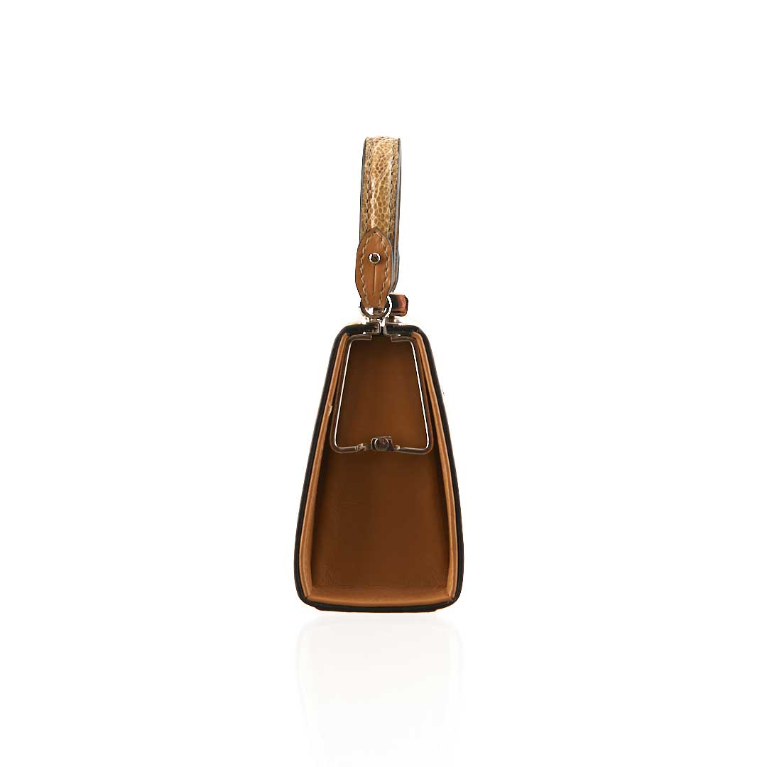 Rose gold necklace with a decorative pendant on a white background