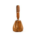 Brown leather handbag with geometric design on a white background