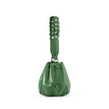 Green handbag with geometric design on a white background